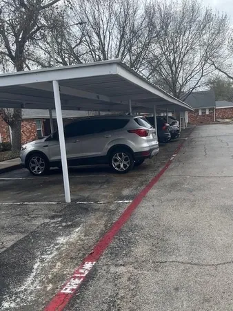 a car parked in front of a house