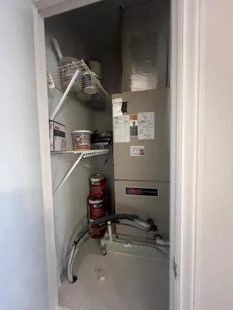 a room with storage and utility