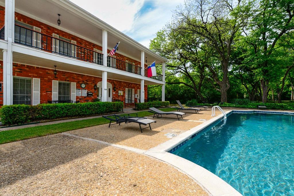 933 Roaring Springs Road Fort Worth, TX 76114 - Photo 23 of 25 a swimming pool with outdoor seating and yard