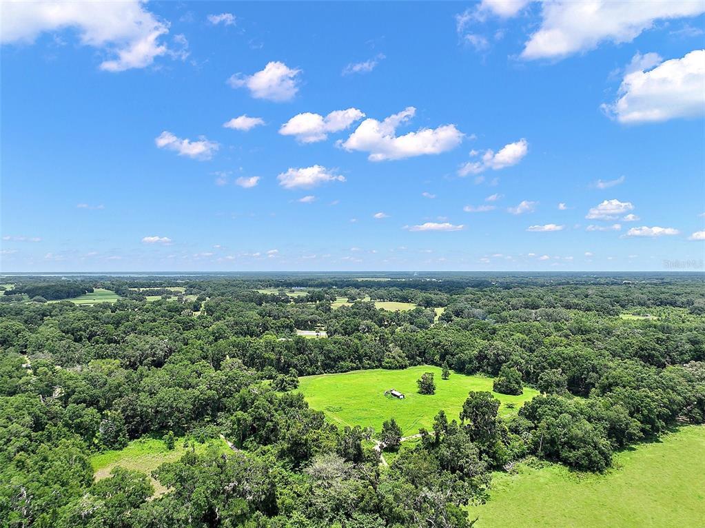 15785 Northwest 33rd Terrace Reddick, FL 32686 - Photo 11 of 11 a view of a big yard