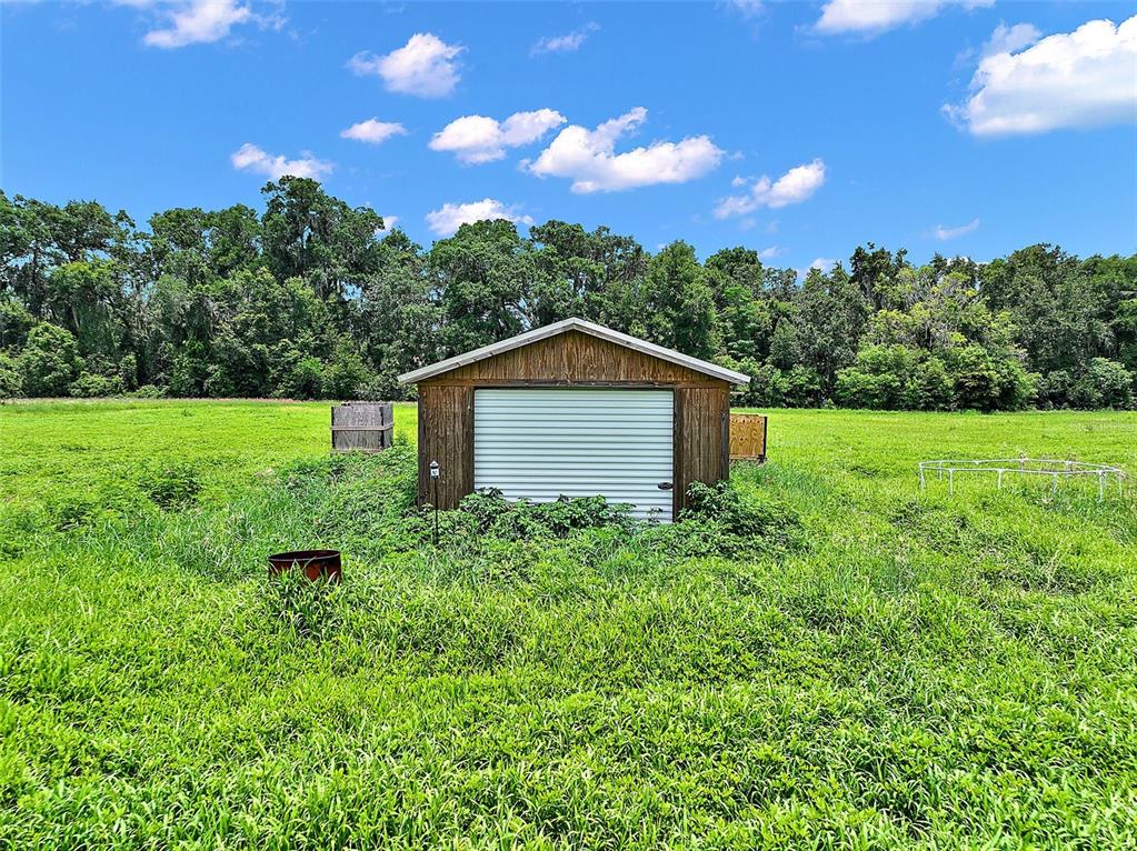 15785 Northwest 33rd Terrace Reddick, FL 32686 - Photo 2 of 11 a view of a back yard