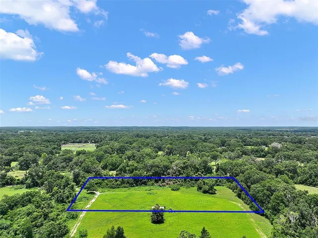 a view of a golf course with a lake