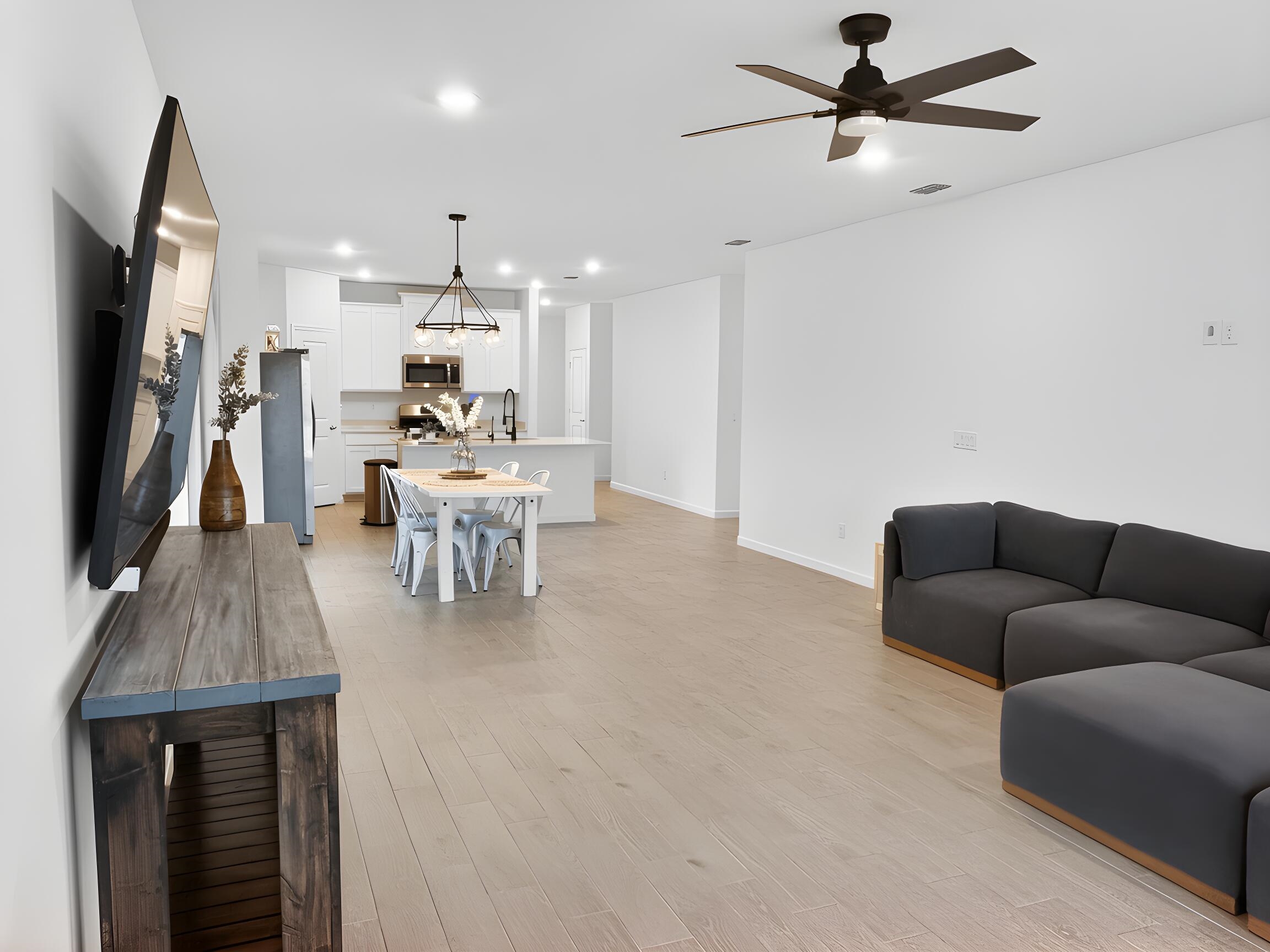 63 Quicksilver Way St. Augustine, FL 32092 - Photo 13 of 36 a living room with furniture and a flat screen tv