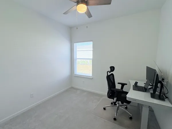 a view of a house with backyard