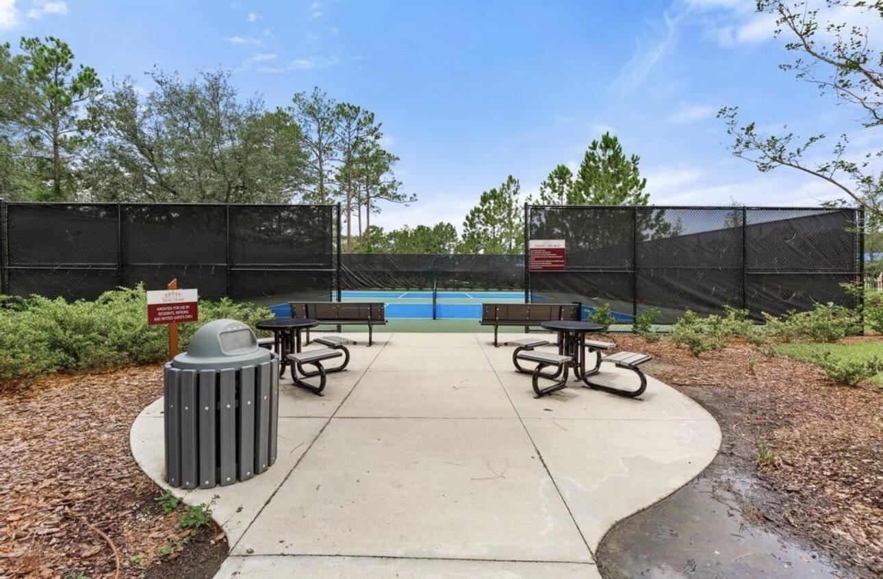 63 Quicksilver Way St. Augustine, FL 32092 - Photo 18 of 36 View of patio with a tennis court