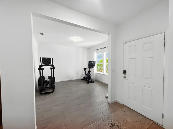 a bedroom with a bed and a cabinets