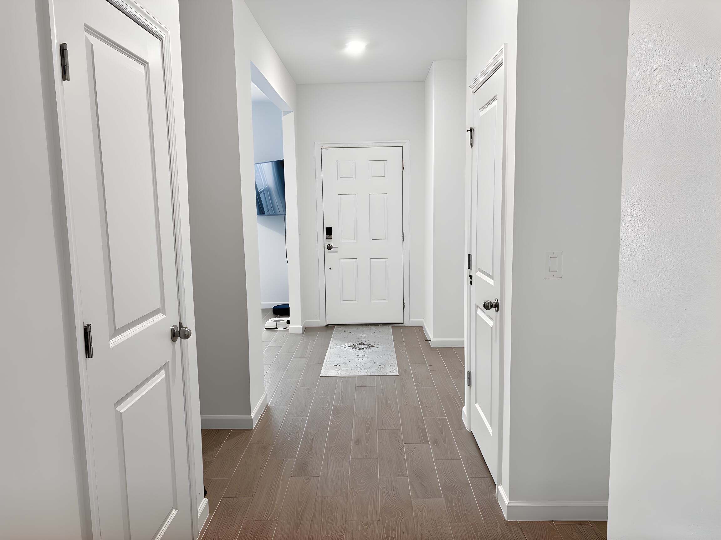 63 Quicksilver Way St. Augustine, FL 32092 - Photo 27 of 36 a view of a hallway with wooden floor and closet area