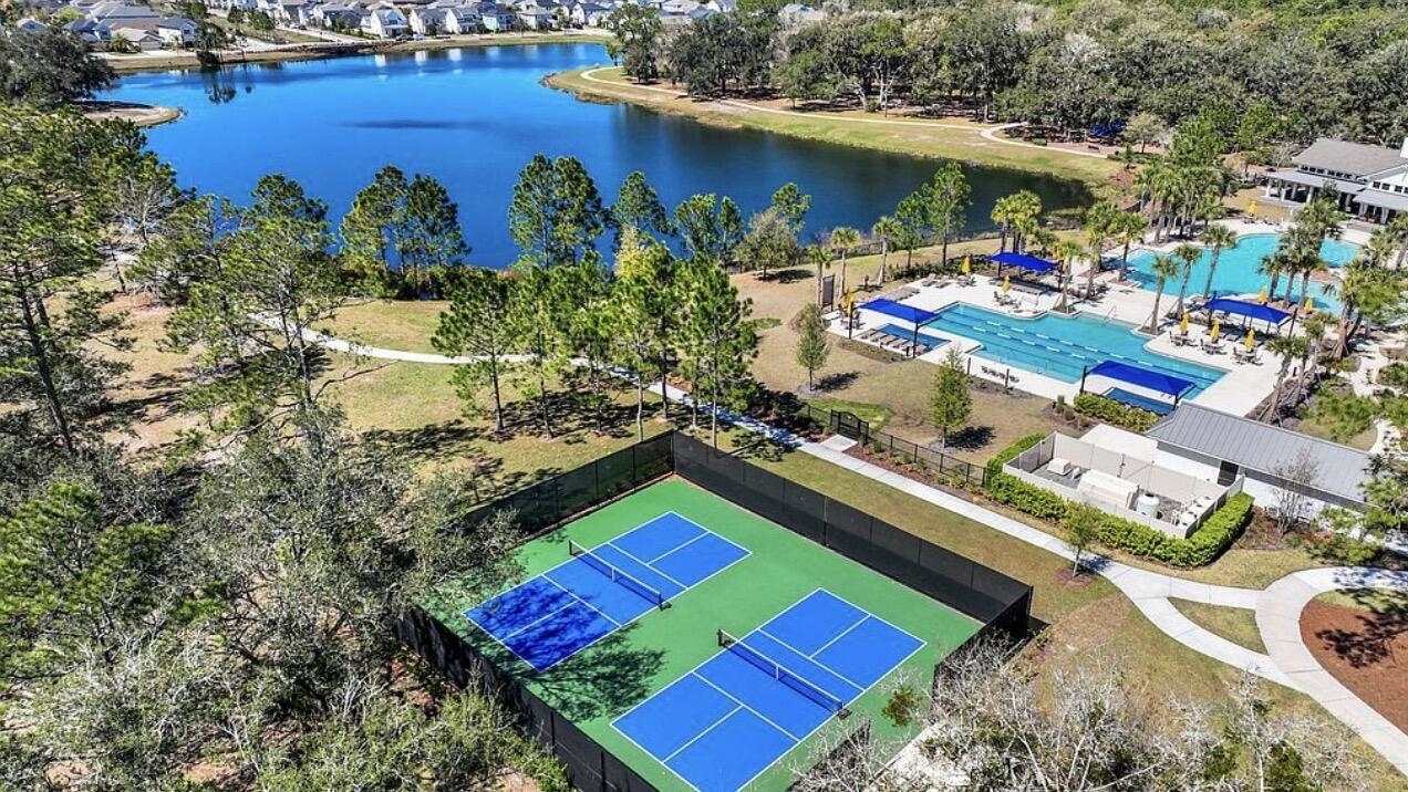 63 Quicksilver Way St. Augustine, FL 32092 - Photo 30 of 36 Drone / aerial view of a nearby body of water and a pool area