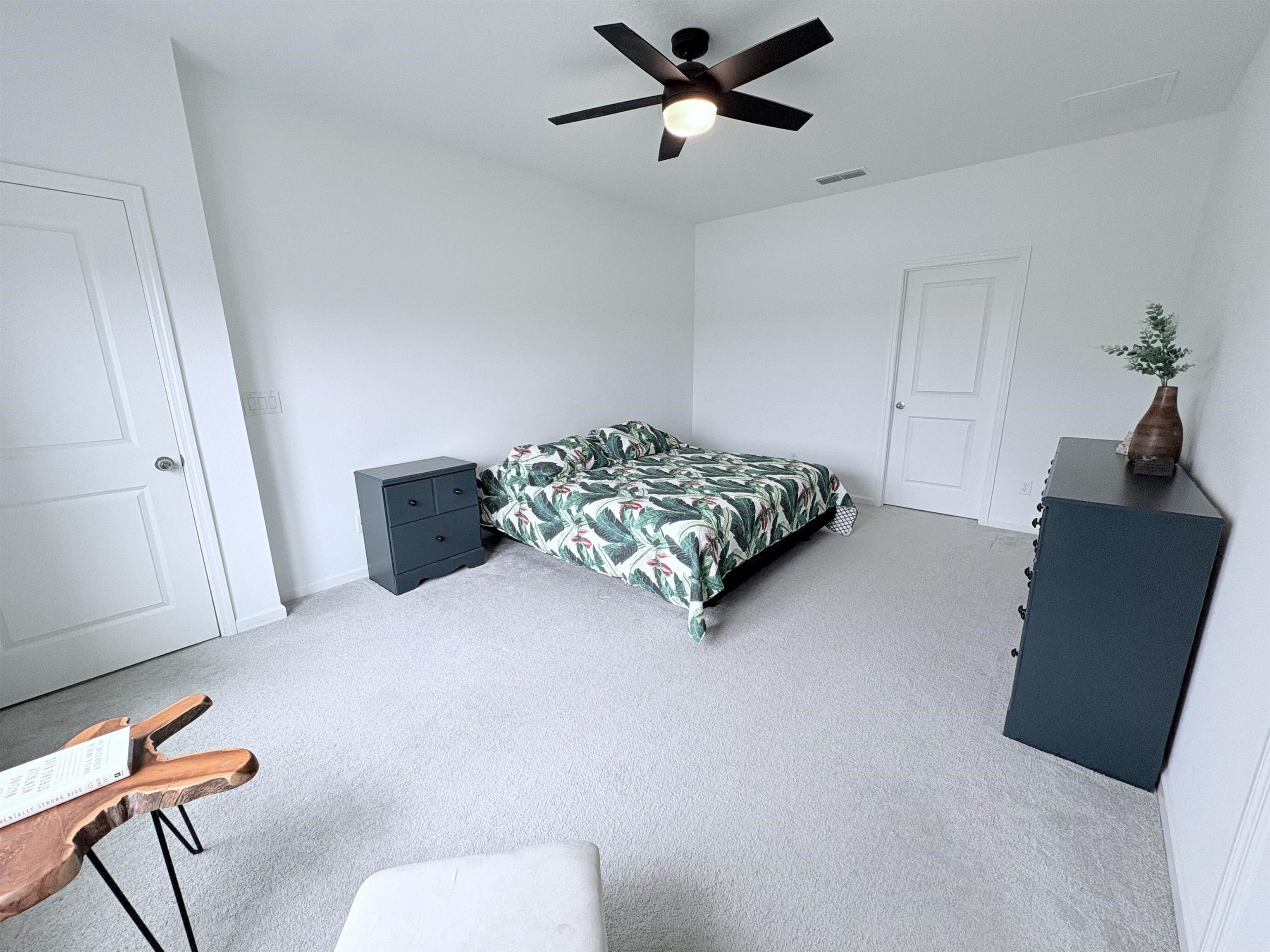 63 Quicksilver Way St. Augustine, FL 32092 - Photo 5 of 36 a living room with furniture and a rug