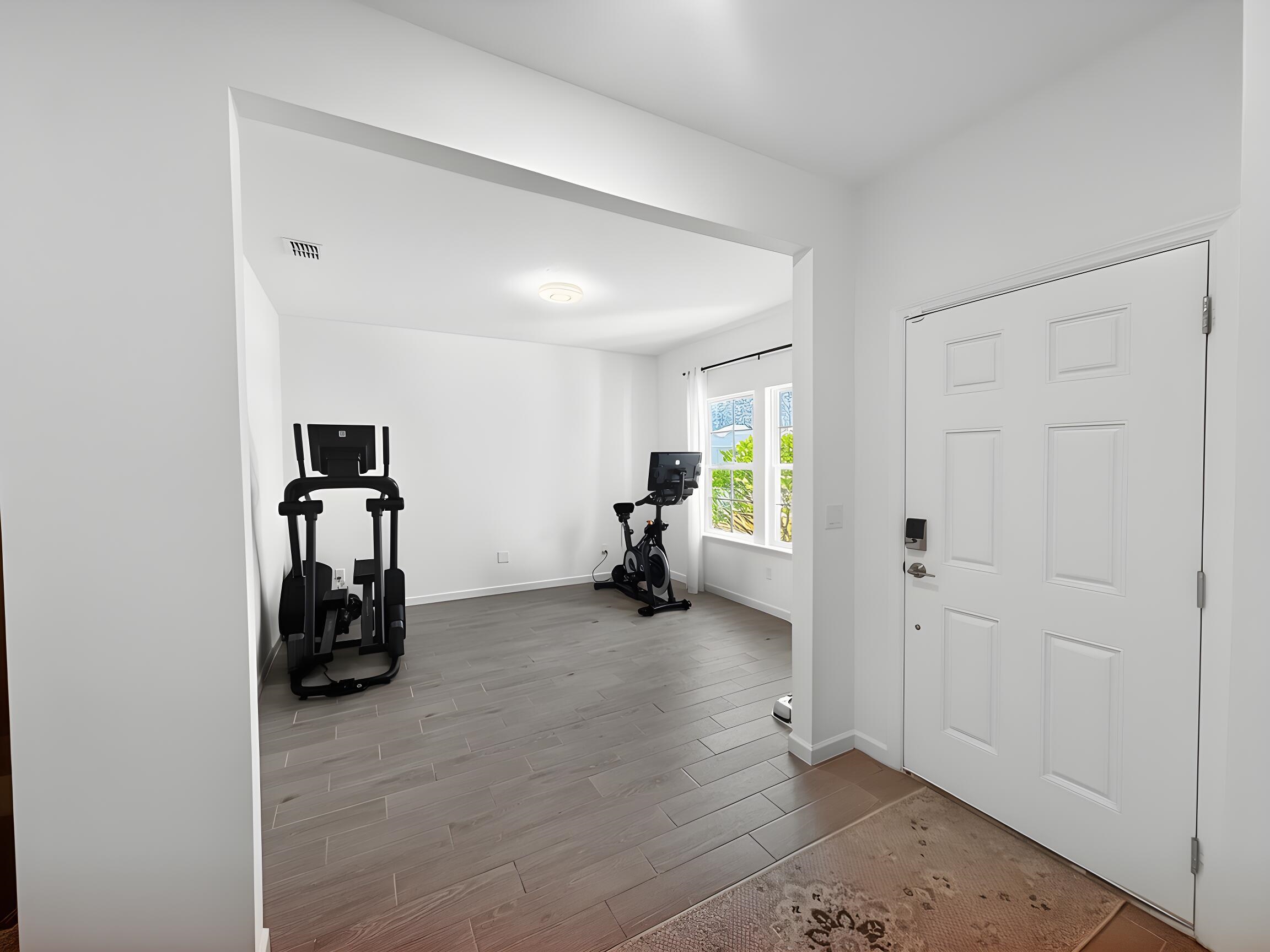 63 Quicksilver Way St. Augustine, FL 32092 - Photo 5 of 33 a view of a room with gym equipment