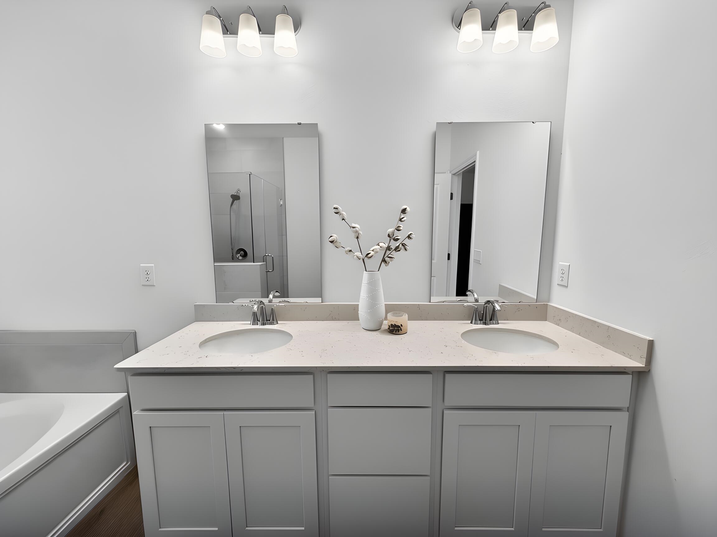 63 Quicksilver Way St. Augustine, FL 32092 - Photo 9 of 36 a bathroom with a sink and a mirror