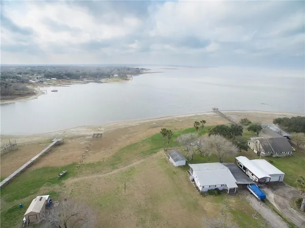 an aerial view of house with beach
