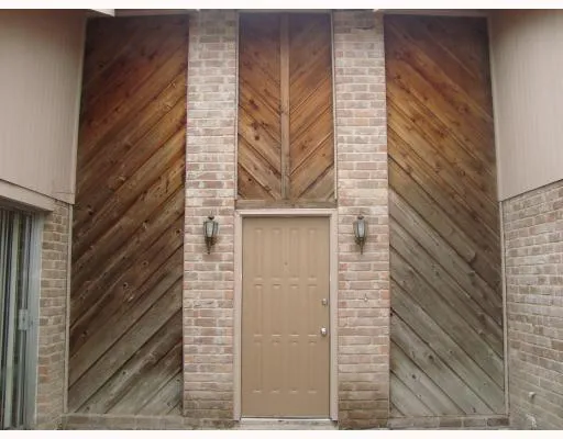 a view of empty room with windows