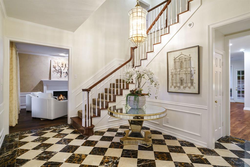 7104 Judi Court Dallas, TX 75252 - Photo 11 of 40 a room with lots of white and furniture and a rug