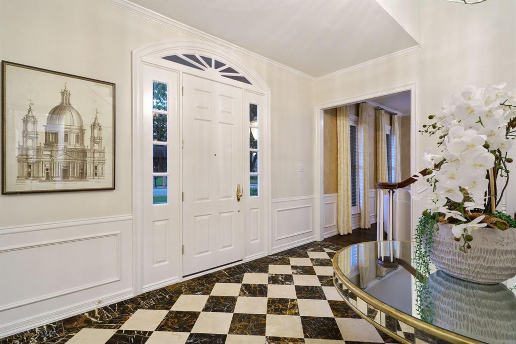 7104 Judi Court Dallas, TX 75252 - Photo 12 of 40 a bathroom with a sink and a mirror