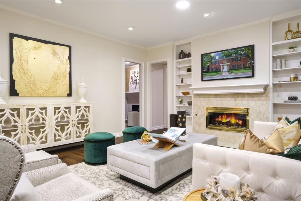 7104 Judi Court Dallas, TX 75252 - Photo 14 of 40 a living room with furniture and a fireplace