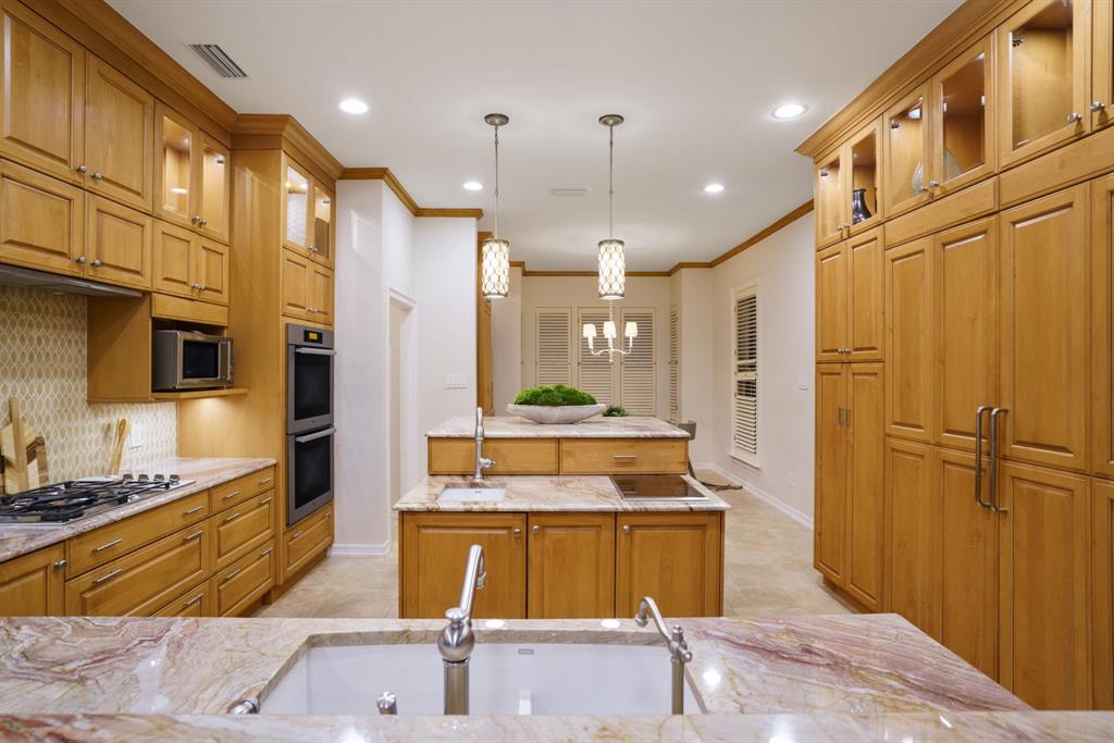 7104 Judi Court Dallas, TX 75252 - Photo 18 of 40 a bathroom with a tub sink shower and mirror