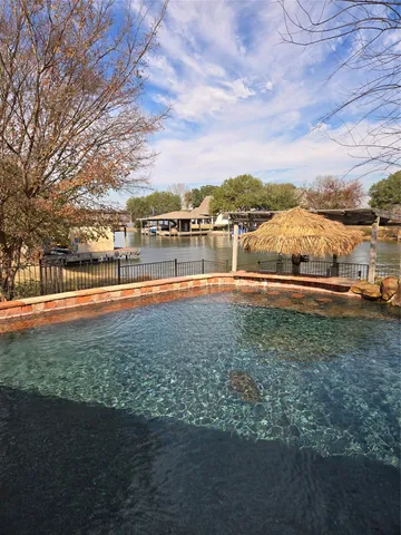 a view of a yard with an outdoor space