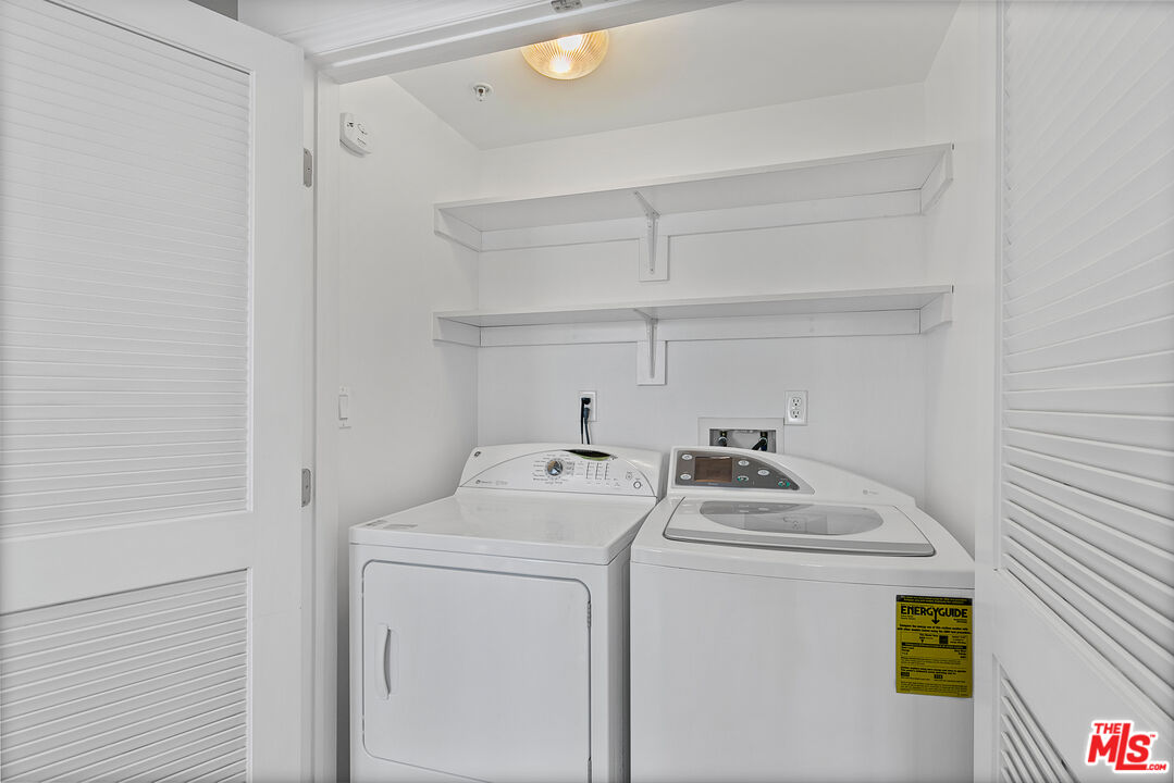 1710 Granville Avenue, Unit 3 Los Angeles, CA 90025 - Photo 16 of 21 a utility room with dryer and washer