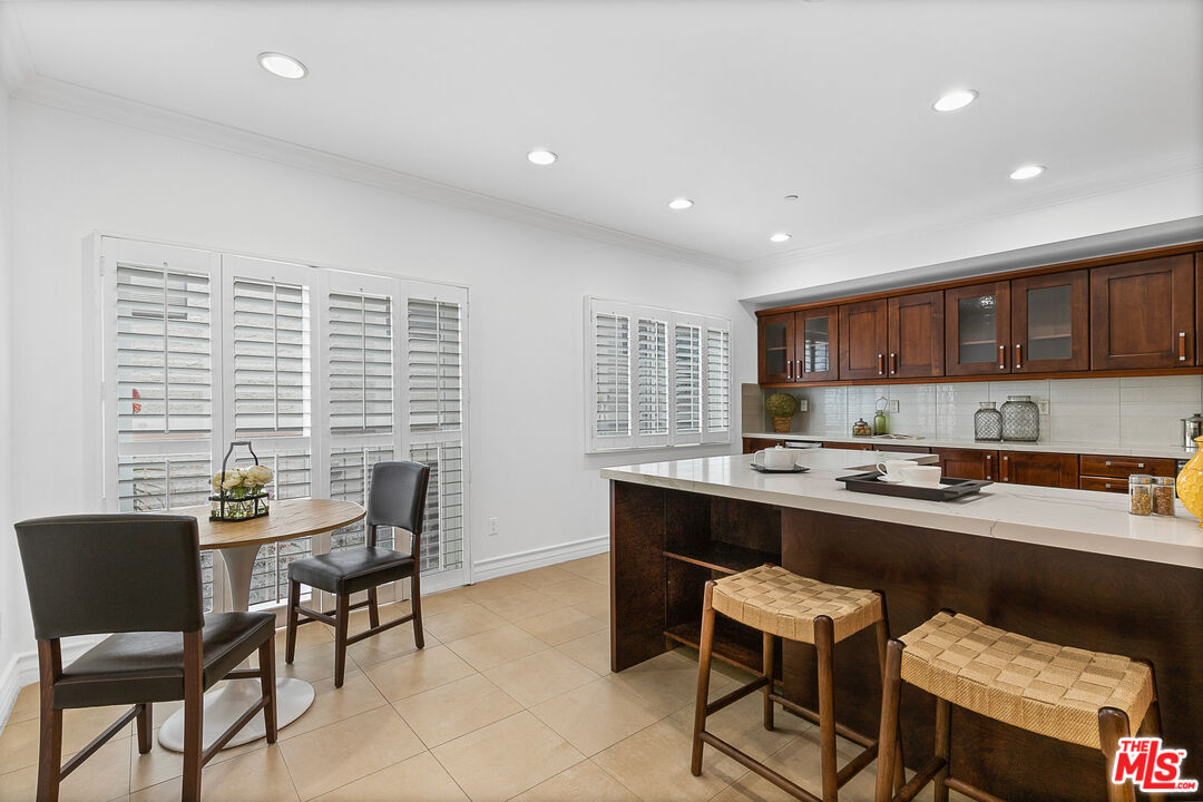 1710 Granville Avenue, Unit 3 Los Angeles, CA 90025 - Photo 5 of 21 a view of a dining room with furniture