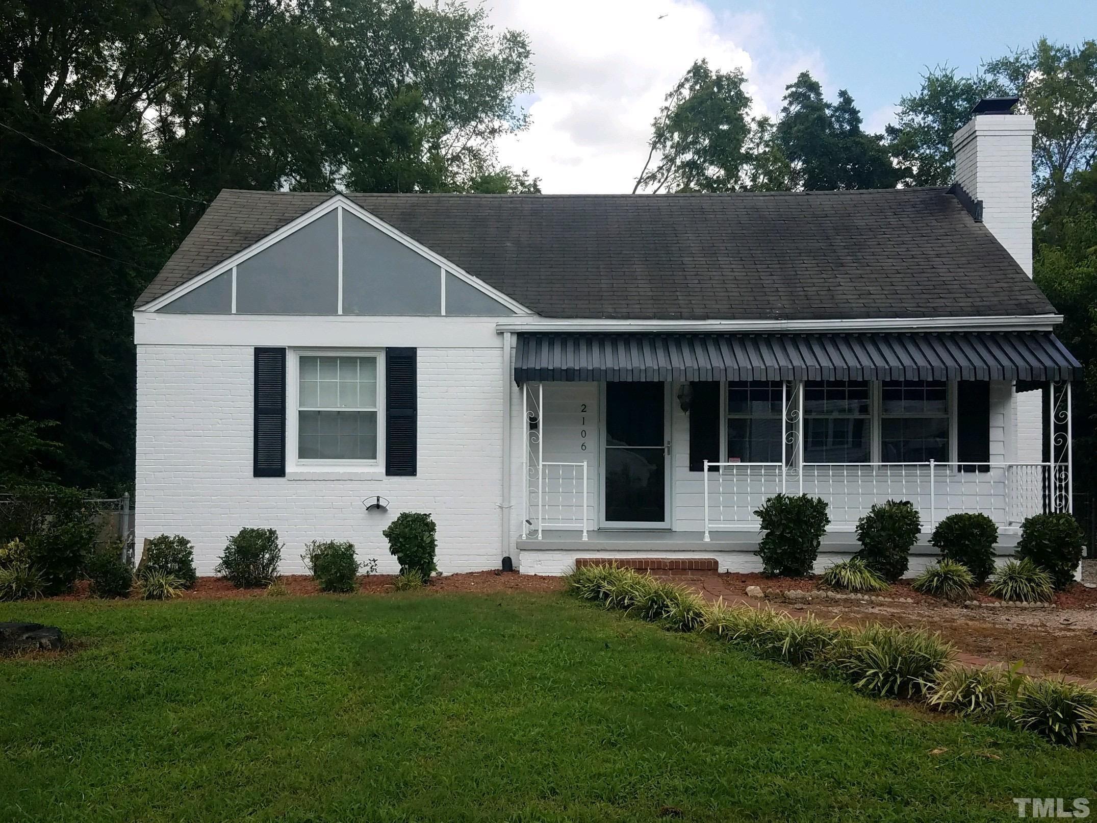2106 Brewer Street Raleigh, NC 27608 - Photo 37 of 38 a view of a house with backyard
