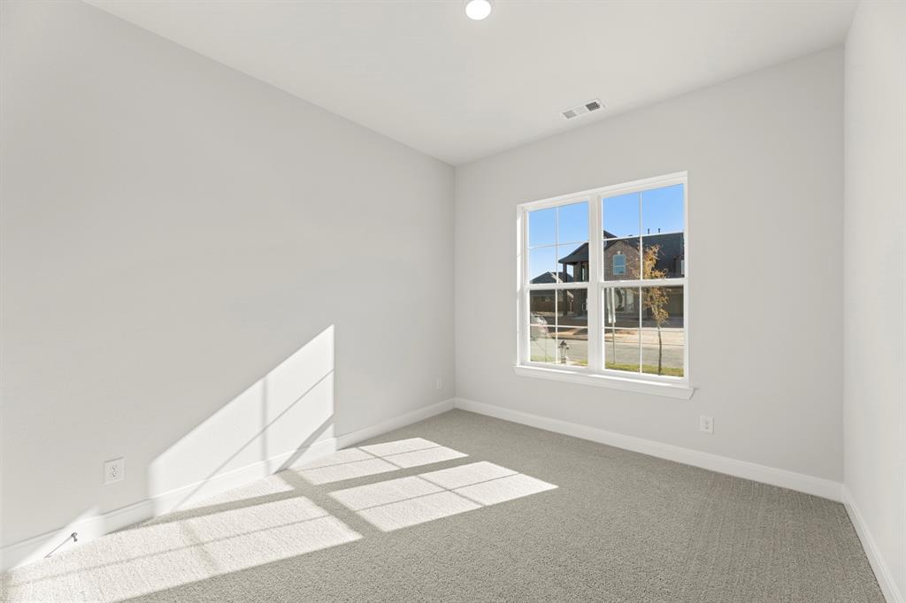 912 Firewood Way Anna, TX 75409 - Photo 5 of 29 a view of an empty room with a window