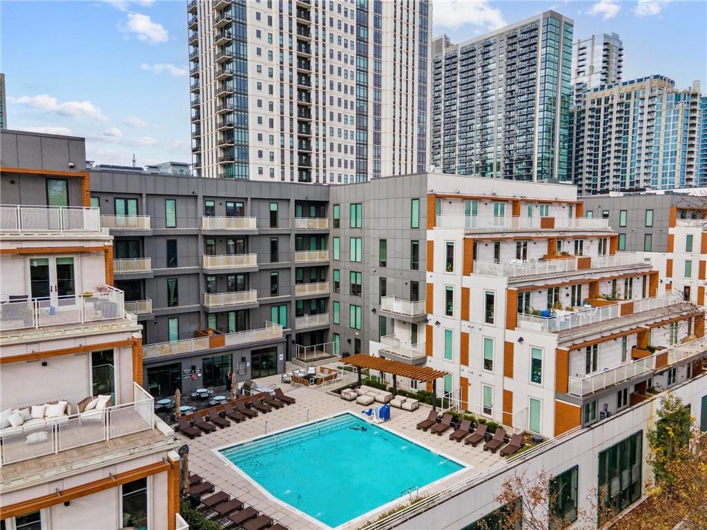 775 Juniper Street Northeast, Unit 613 Atlanta, GA 30308 - Photo 32 of 39 a picture of a building with many windows