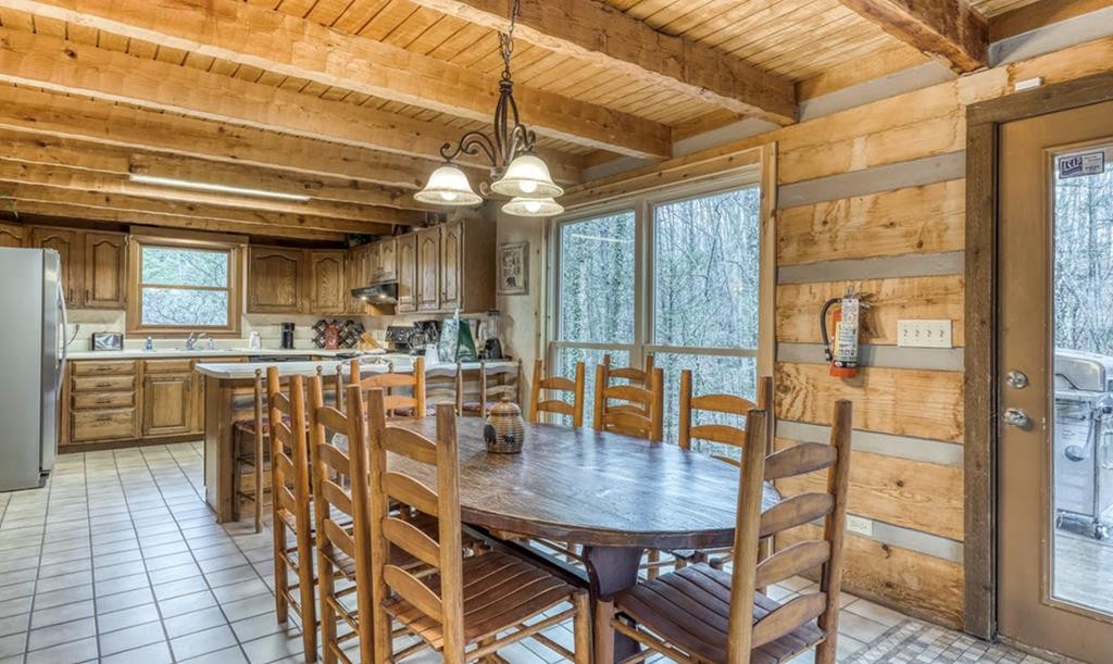 4296 Powdermill Estates Road Sevierville, TN 37876 - Photo 5 of 55 a view of a dining room with furniture and chandelier