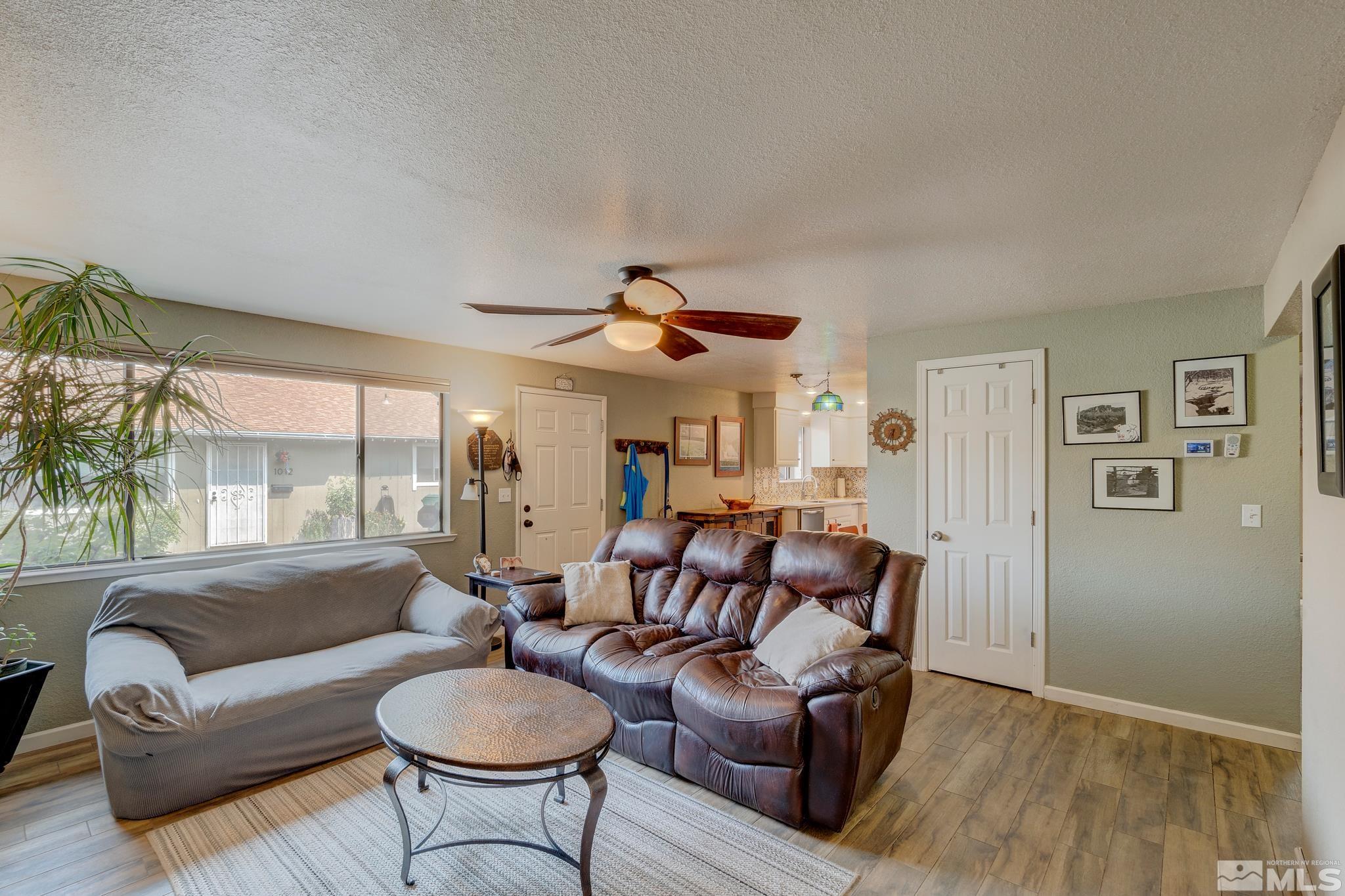 1000 Roberts Street Reno, NV 89502 - Photo 9 of 40 a living room with furniture and a large window