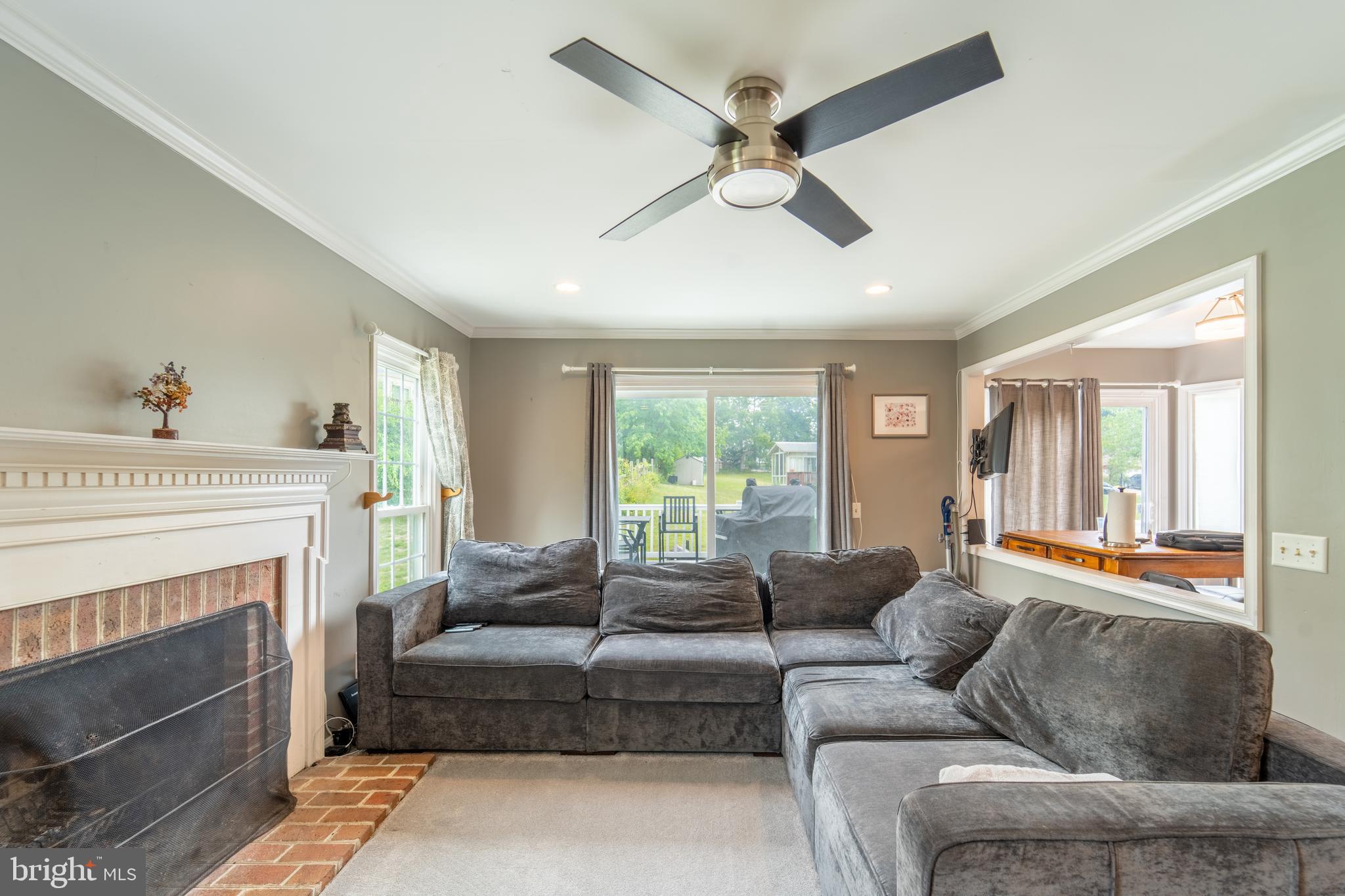 8806 Bovelder Drive Laurel, MD 20708 - Photo 17 of 37 Living room w/fireplace