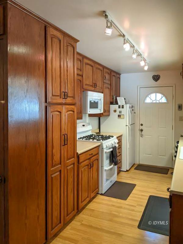 25915 Wayne Road Idyllwild, CA 92549 - Photo 21 of 69 a kitchen with stainless steel appliances granite countertop a refrigerator and a stove top oven
