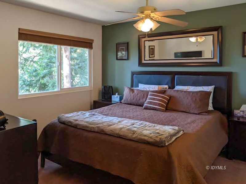 25915 Wayne Road Idyllwild, CA 92549 - Photo 29 of 69 a bedroom with a bed and a tv