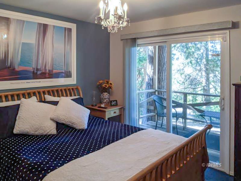 25915 Wayne Road Idyllwild, CA 92549 - Photo 37 of 69 a bedroom with furniture and windows