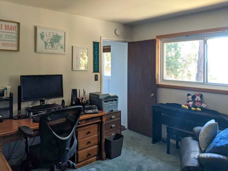 25915 Wayne Road Idyllwild, CA 92549 - Photo 43 of 69 a livingroom with workspace and a window
