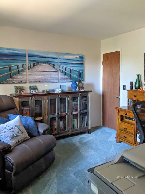 25915 Wayne Road Idyllwild, CA 92549 - Photo 45 of 69 a living room with furniture and a flat screen tv