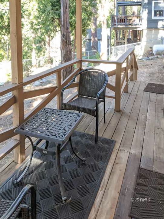 25915 Wayne Road Idyllwild, CA 92549 - Photo 50 of 69 a view of a chairs and table on the balcony