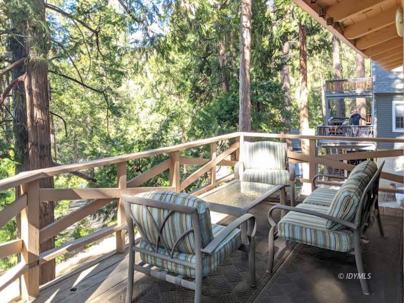 25915 Wayne Road Idyllwild, CA 92549 - Photo 54 of 69 a view of a chairs and table in the balcony