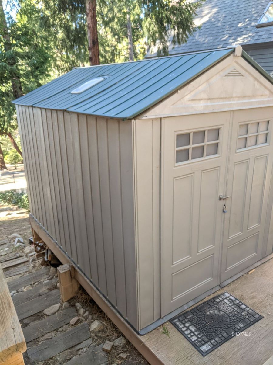 25915 Wayne Road Idyllwild, CA 92549 - Photo 63 of 69 a wooden house with a wooden fence