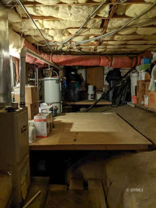 25915 Wayne Road Idyllwild, CA 92549 - Photo 68 of 69 a view of a patio with table and chairs under an umbrella