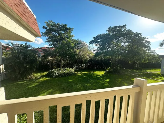 a view of a wooden fence