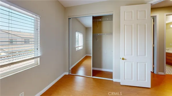 a view of front door with wooden floor