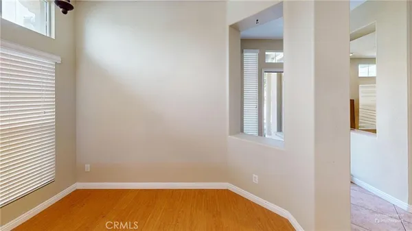 a view of a room with windows