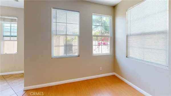 an empty room with windows