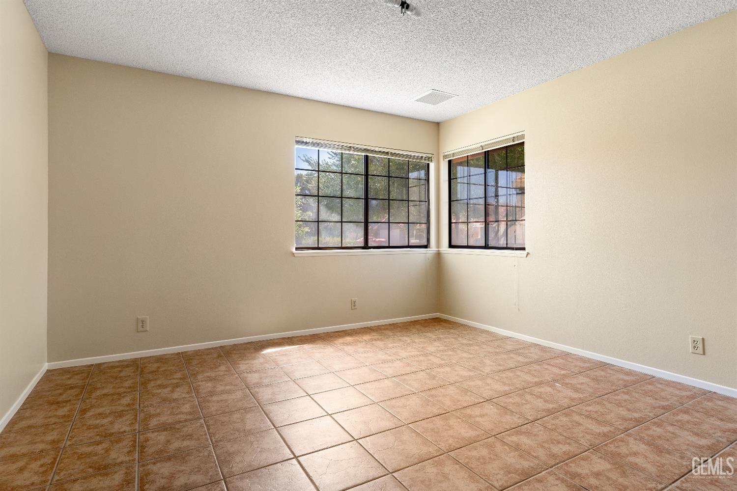 Undisclosed Address Ridgecrest, CA 93555 - Photo 12 of 25 a view of an empty room with a window