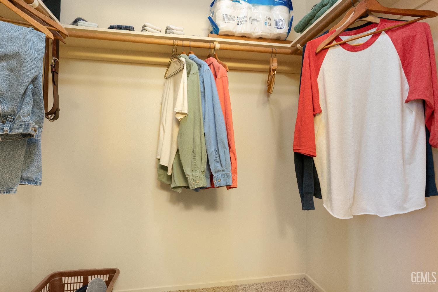 Undisclosed Address Ridgecrest, CA 93555 - Photo 17 of 25 a view of walk in closet with clothes and shoes