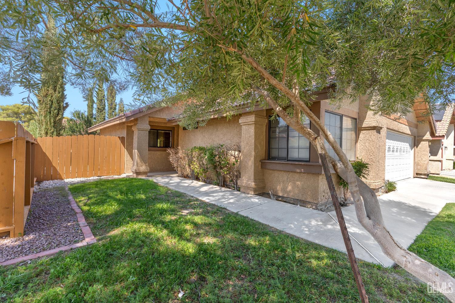 Undisclosed Address Ridgecrest, CA 93555 - Photo 19 of 25 a front view of house with yard and green space