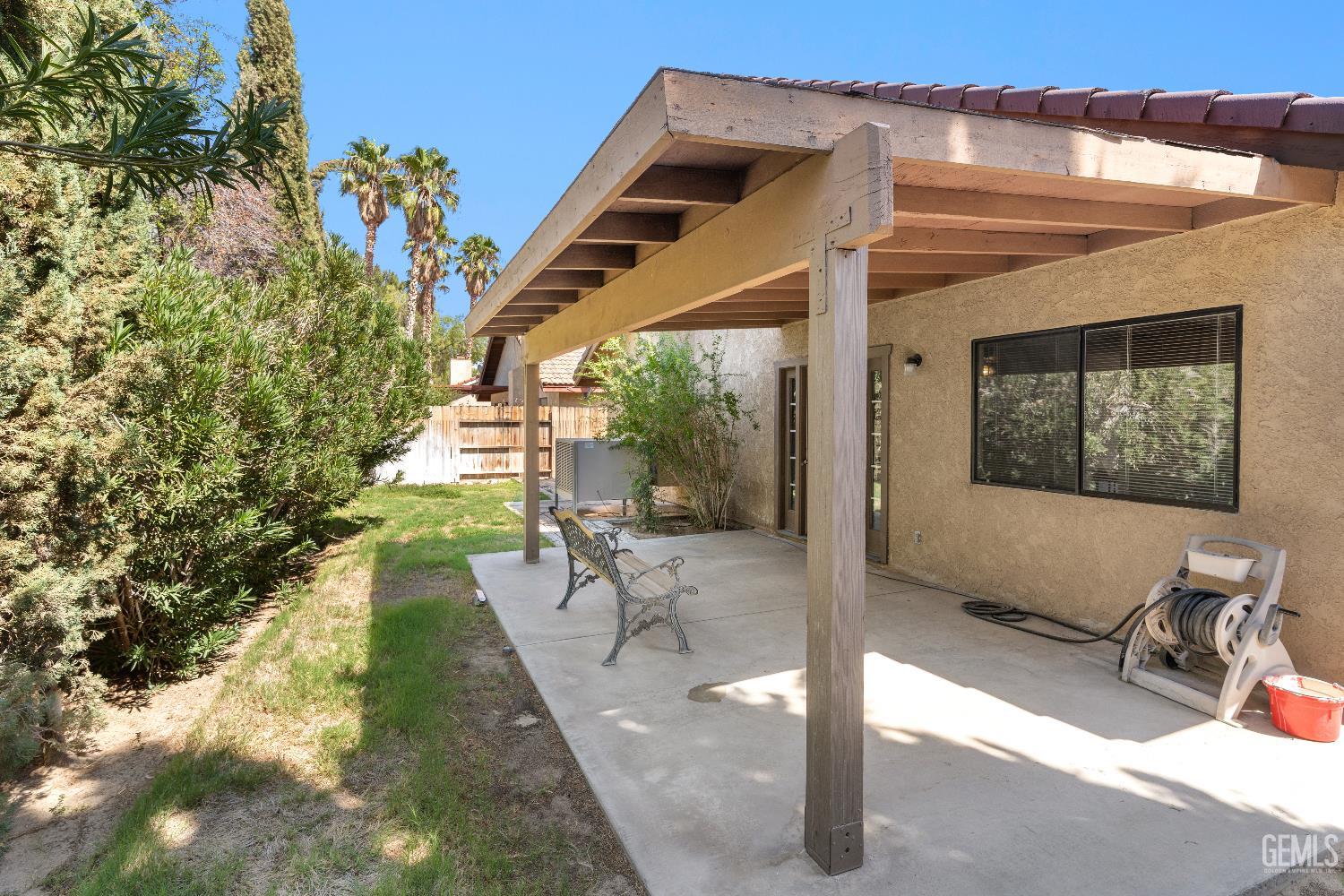 Undisclosed Address Ridgecrest, CA 93555 - Photo 23 of 25 a view of a patio with table and chairs and potted plants