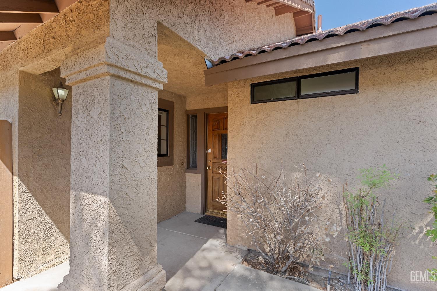 Undisclosed Address Ridgecrest, CA 93555 - Photo 3 of 25 a view of a front door and wooden floor
