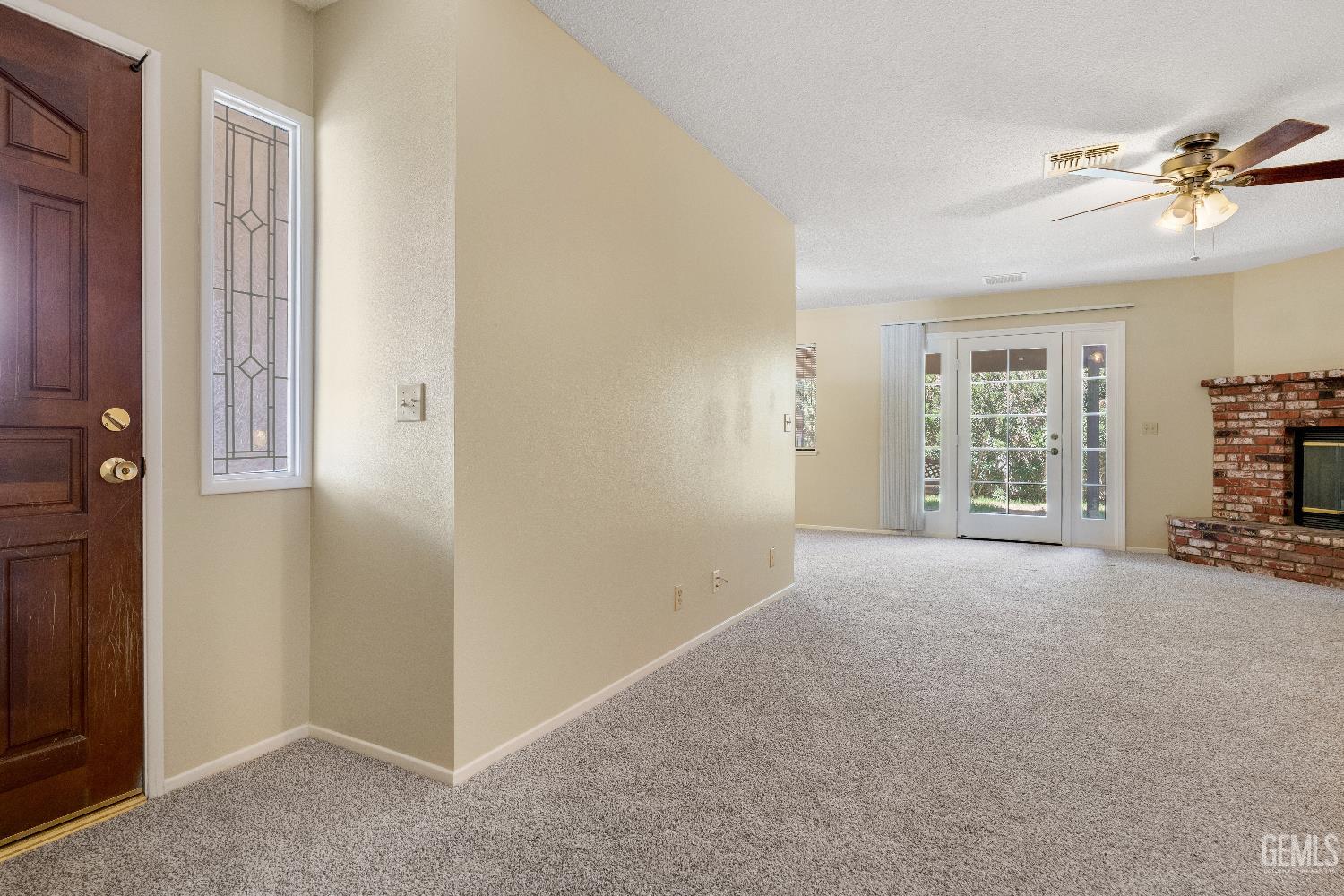 Undisclosed Address Ridgecrest, CA 93555 - Photo 4 of 25 a view of a livingroom with a ceiling fan and window