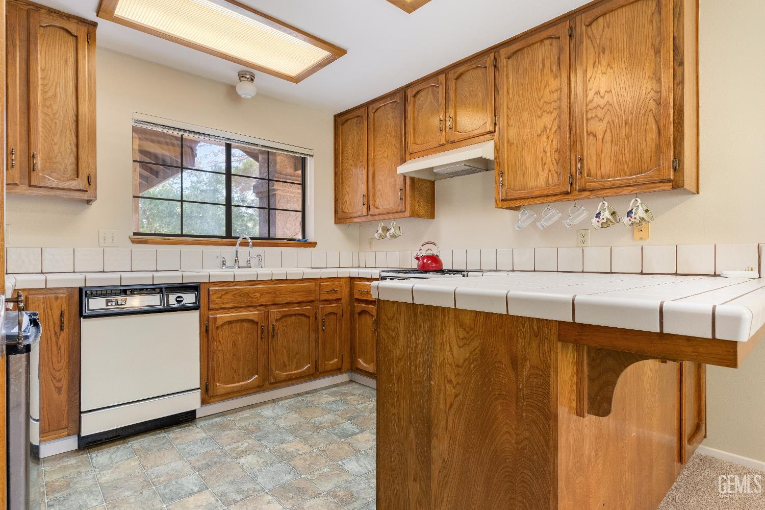 Undisclosed Address Ridgecrest, CA 93555 - Photo 6 of 25 a kitchen with stainless steel appliances granite countertop a sink and cabinets